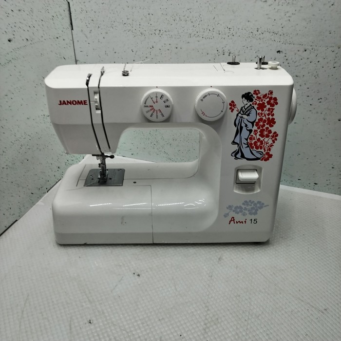 Швейная машина Janome AMI 15